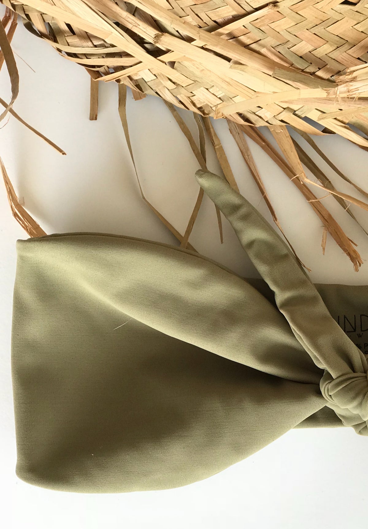 Indah Swim Jax top in Olive. Perfect for sun baking, Bandeau style tie up at the bust. 